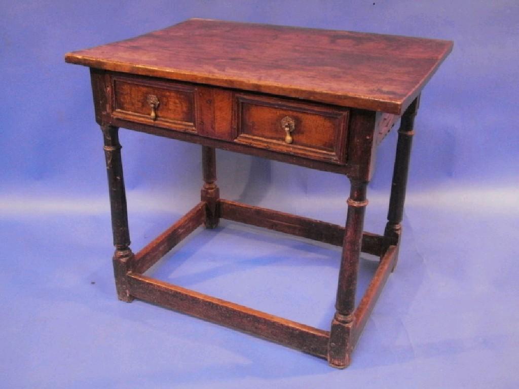 Appraisal: A late thC oak side table with three plank top