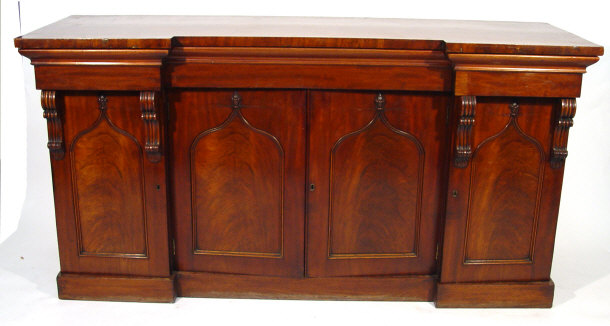 Appraisal: Victorian mahogany sideboard fitted with three cushion drawers above a