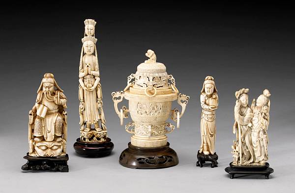 Appraisal: Chinese Ivory The first a tinted ivory figure of Guan