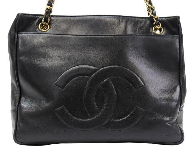 Appraisal: Chanel smooth black leather shoulder tote bag featuring gold-tone hardware