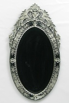 Appraisal: A Venetian-Style Mirror A beautiful oval shaped Venetian-style mirror with