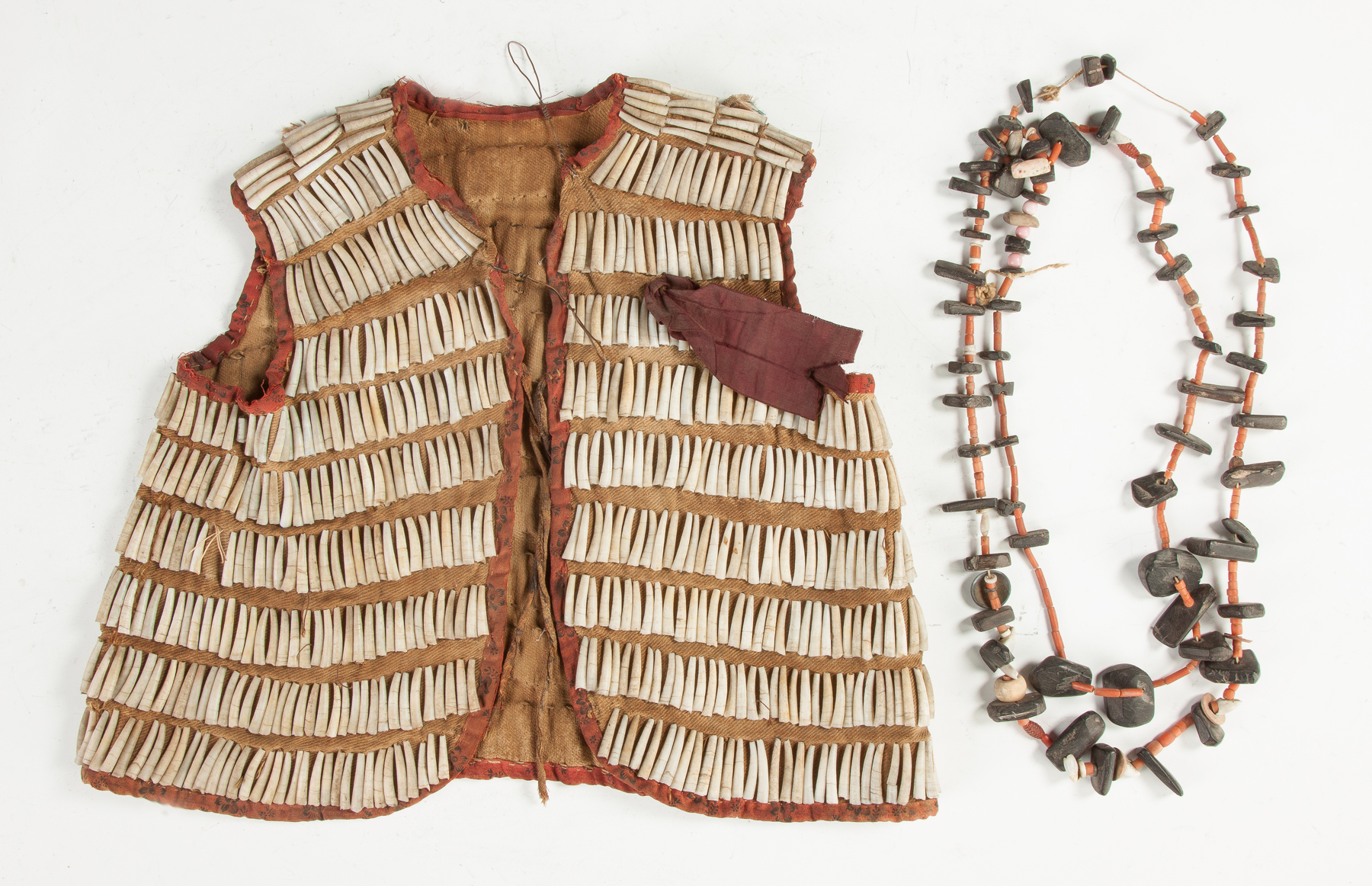 Appraisal: Native American Child's Vest Two Necklaces Vest is decorated with