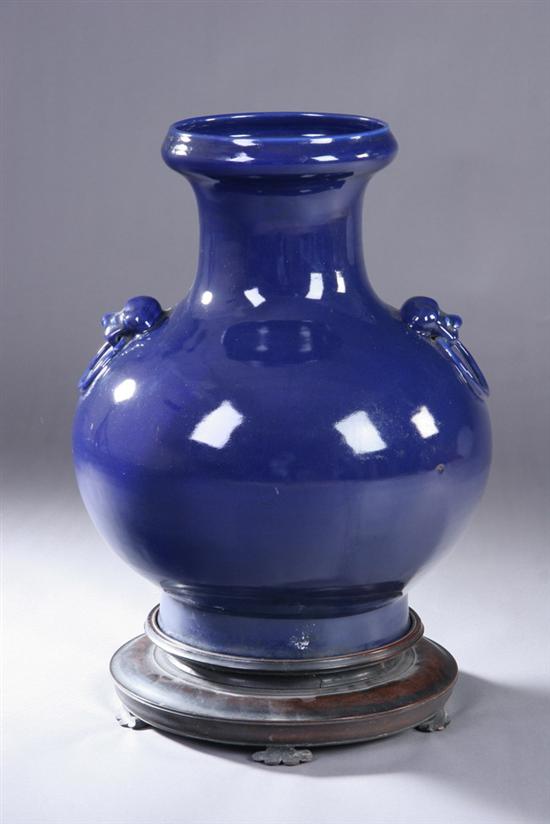 Appraisal: CHINESE MONOCHROME BLUE PORCELAIN VASE Qianlong underglazed blue mark Fu-lion-form