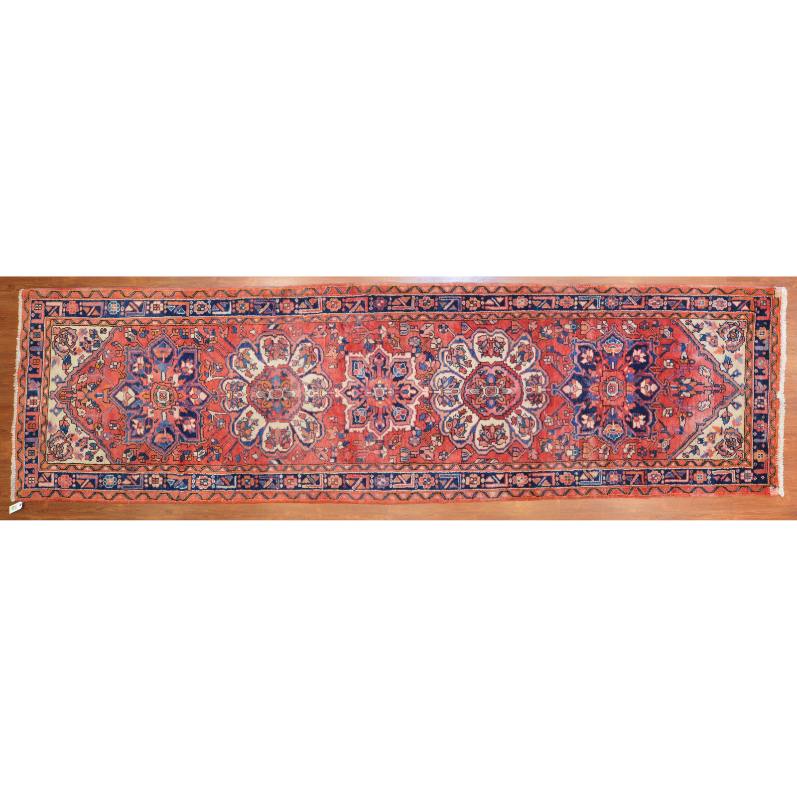 Appraisal: HERIZ RUNNER PERSIA X Fourth quarter- th century hand-knotted wool