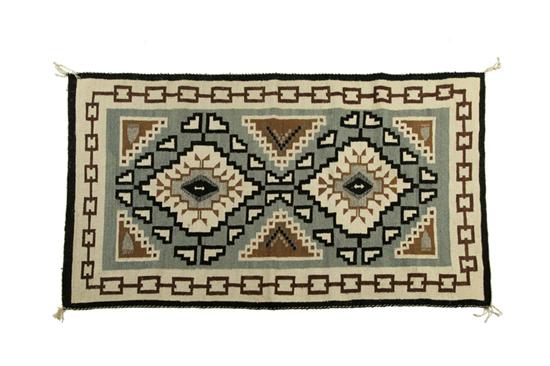 Appraisal: NAVAJO RUG Twentieth century wool Diamonds on a grey ground