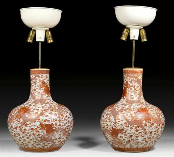 Appraisal: A PAIR OF LARGE VASES WITH IRON RED DESIGN OF