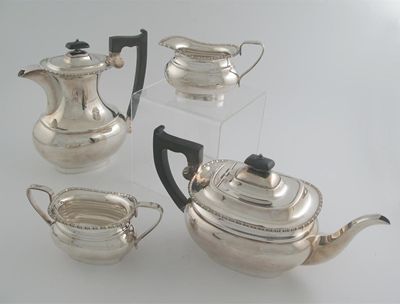 Appraisal: A modern four piece tea service of rounded oblong form