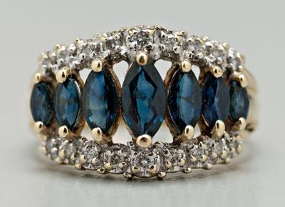 Appraisal: Sapphire and diamond ring center row of seven graduated marquis-cut