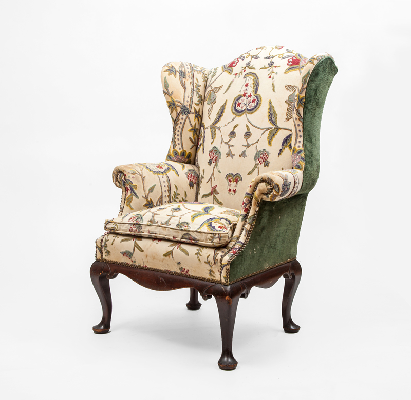 Appraisal: CHIPPENDALE STYLE CARVED MAHOGANY WING CHAIR Upholstery in floral needlework