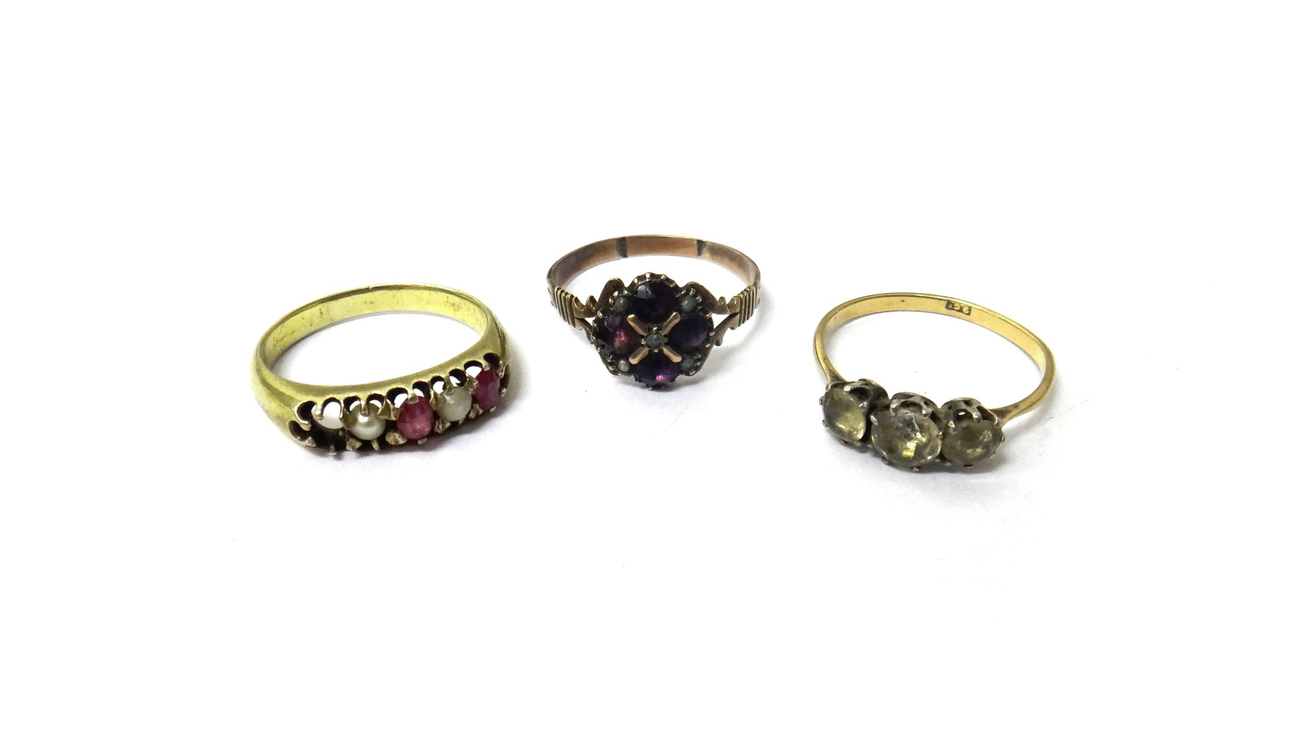 Appraisal: A Victorian gold garnet and seed pearl set cluster ring