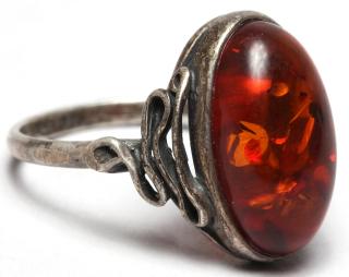 Appraisal: Sterling Silver Amber Ring An oval amber cabochon likely Baltic