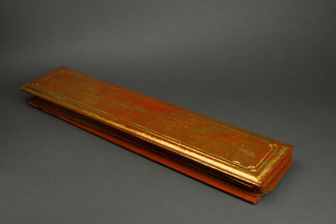 Appraisal: BURMESE GILT LACQUERED BUDDHIST SUTRA COVERS AND PAGES Burmese gilt