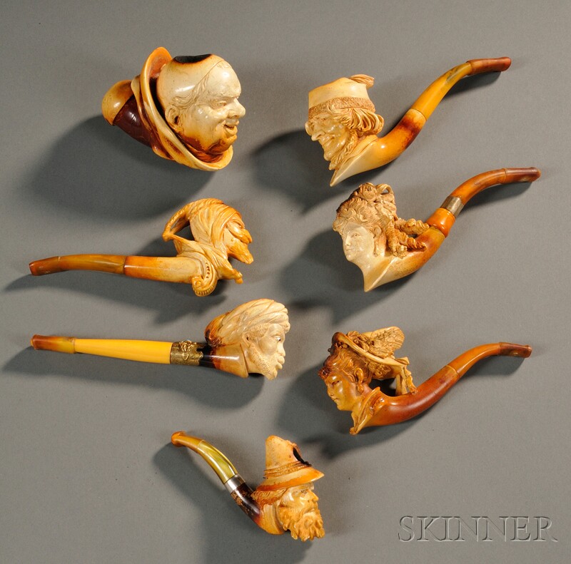 Appraisal: Seven Carved Meerschaum Portrait Pipes one of a woman with