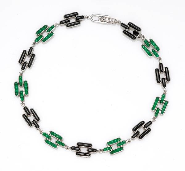 Appraisal: An emerald black onyx and diamond bracelet mounted in eighteen