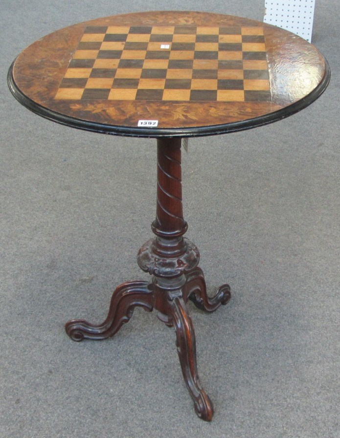 Appraisal: A Victorian parquetry and marquetry inlaid walnut circular tripod table