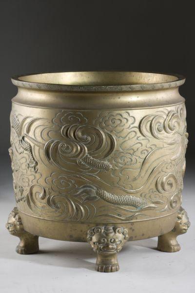 Appraisal: Chinese Brass Planter circa four feet cast as Foo Lions