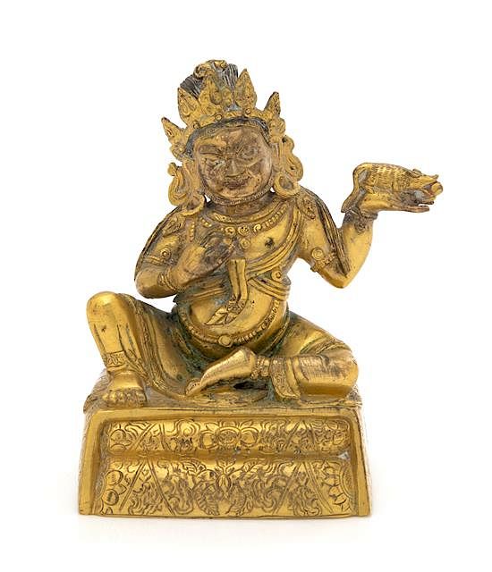 Appraisal: A Sino-Tibetan Gilt Bronze Figure of Jambhala Height inches A