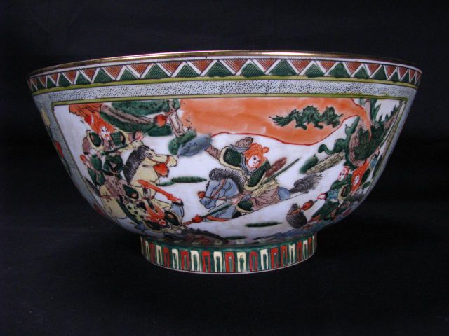 Appraisal: Imari style Oriental porcelain console bowl depicting warriors flowers butterflies