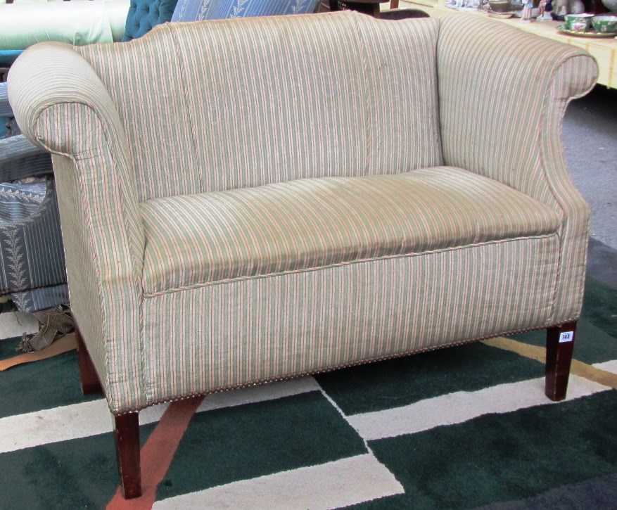 Appraisal: A small th century design sofa with rollover back and