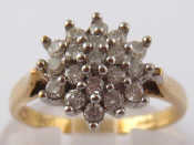 Appraisal: A carat gold diamond cluster ring head approx mm diameter