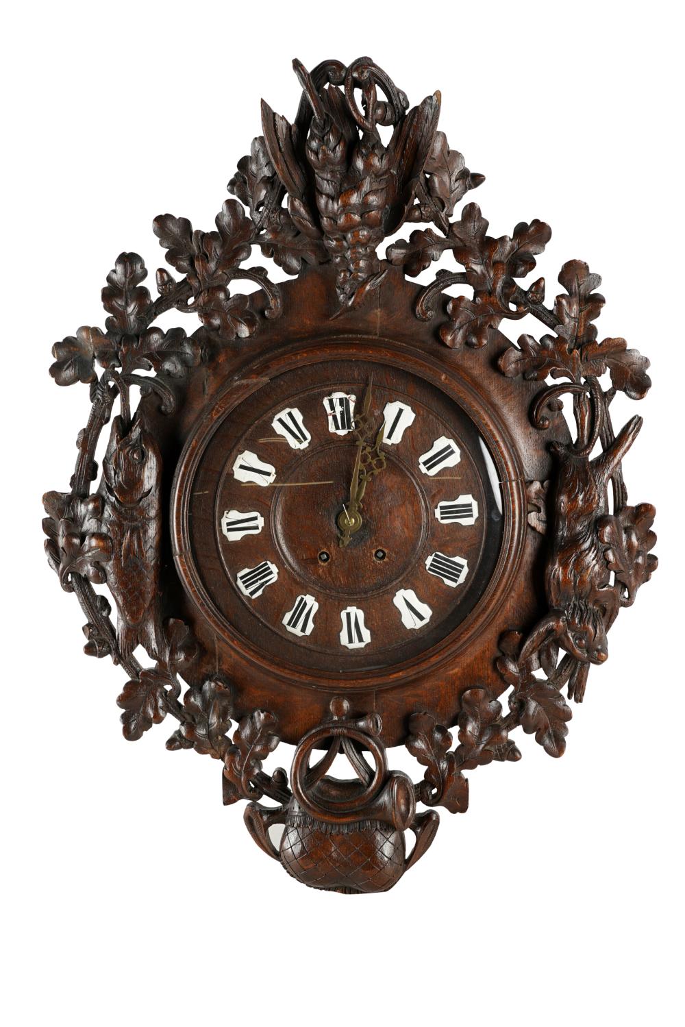 Appraisal: BLACK FOREST STYLE CARVED WOOD WALL CLOCKCondition with damage to