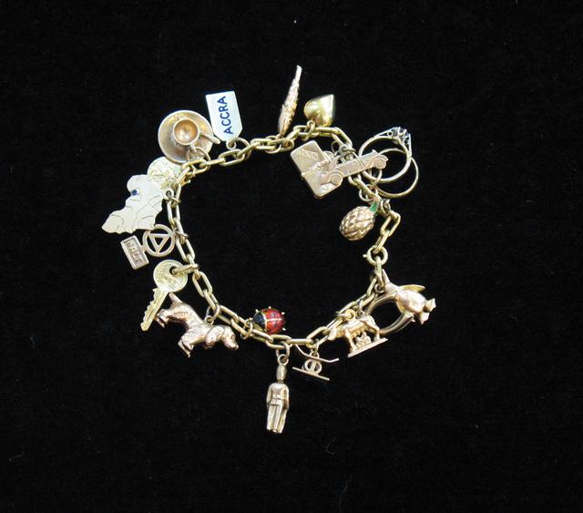 Appraisal: AN CT YELLOW GOLD BELCHER LINK CHARM BRACELET with gold