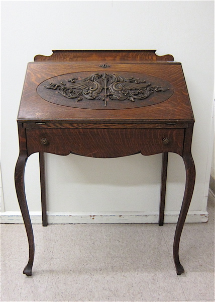 Appraisal: CARVED OAK SLANT-FRONT WRITING DESK American late th century Dimensions