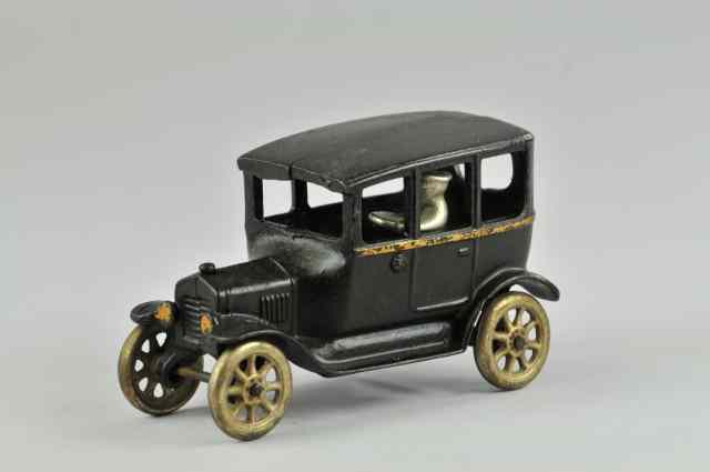 Appraisal: CENTER DOOR MODEL ''T'' SEDAN Arcade cast iron painted black