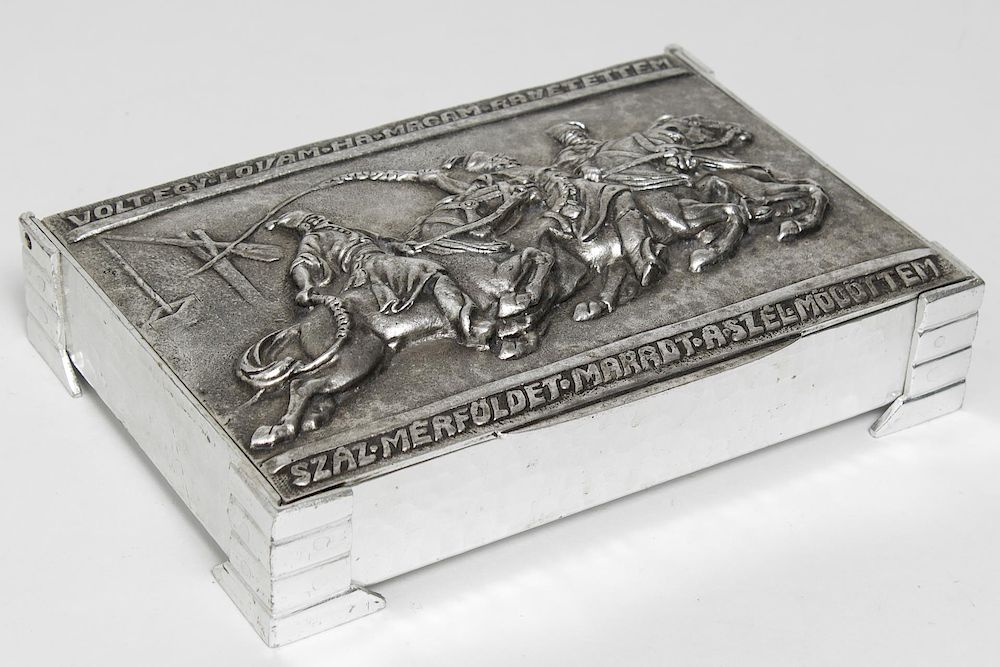 Appraisal: Hungarian Vintage Cigarette Box with Hunt Scene Hungarian metal cigarette