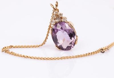 Appraisal: An amethyst and diamond pendant the oval pale coloured amethyst