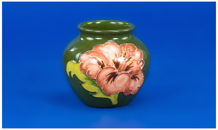 Appraisal: Small Moorcroft Hibiscus Vase On A Green Ground Height Inches