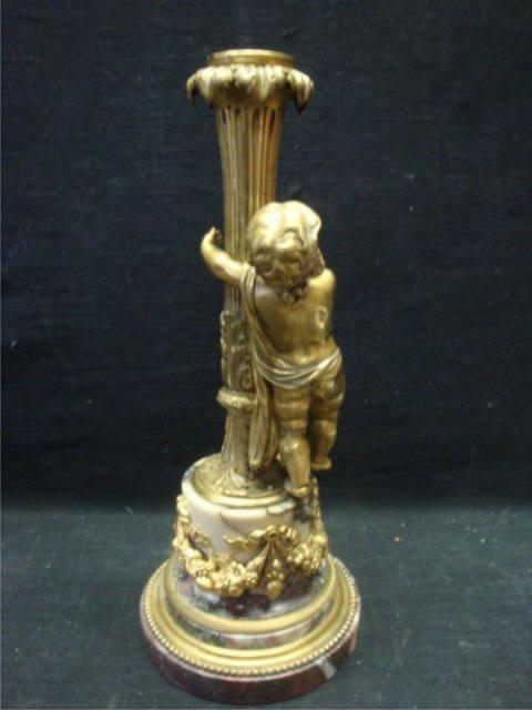 Appraisal: Gilt Bronze and Marble Figural Candlestick From a Long Island