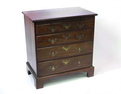 Appraisal: A George III style mahogany chest fitted a brushing slide