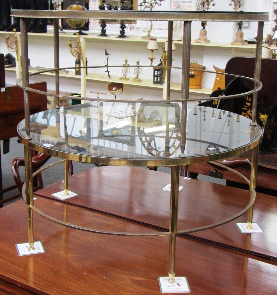 Appraisal: A pair of th century glass top circular coffee tables