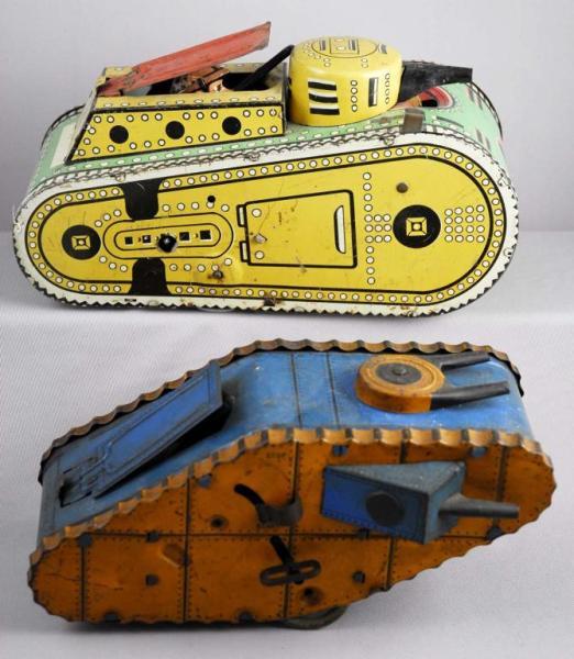 Appraisal: Lot of Marx Tin Wind-Up Doughboy Tank Toys Description Circa