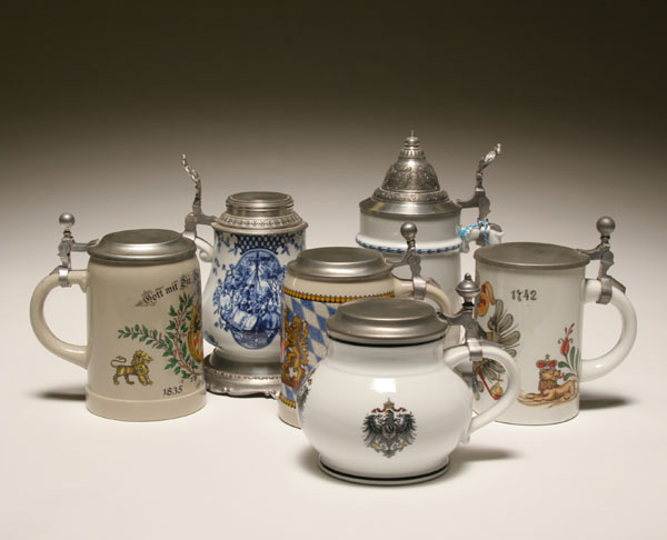 Appraisal: Six German decorated steins pewter lids and thumb lifts painted