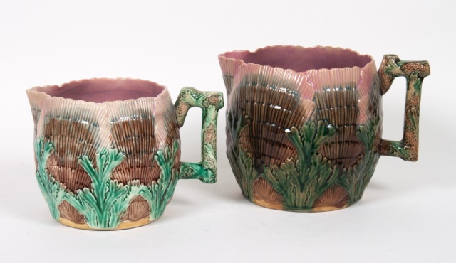 Appraisal: Two Griffin Smith Hill majolica jugs late th century coral