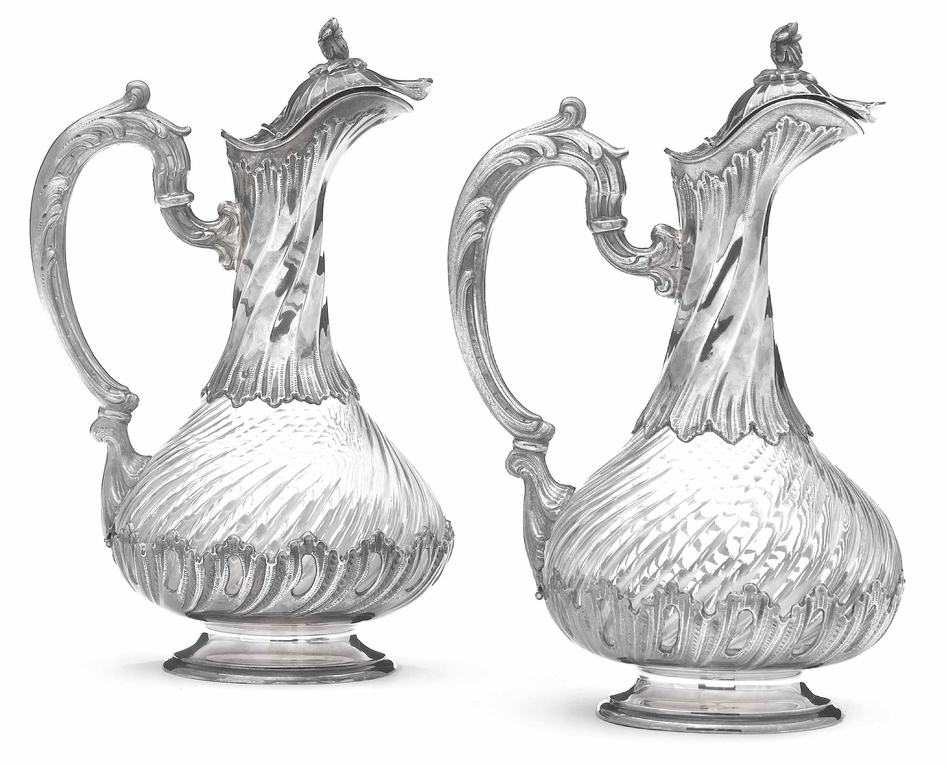 Appraisal: A French standard silver mounted glass pair of claret jugs