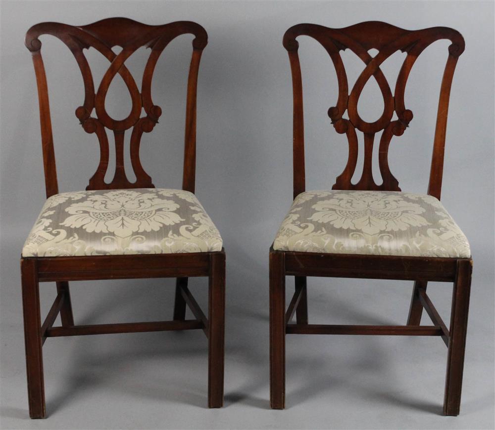 Appraisal: PAIR OF CHIPPENDALE STYLE CARVED MAHOGANY SIDE CHAIRS each having