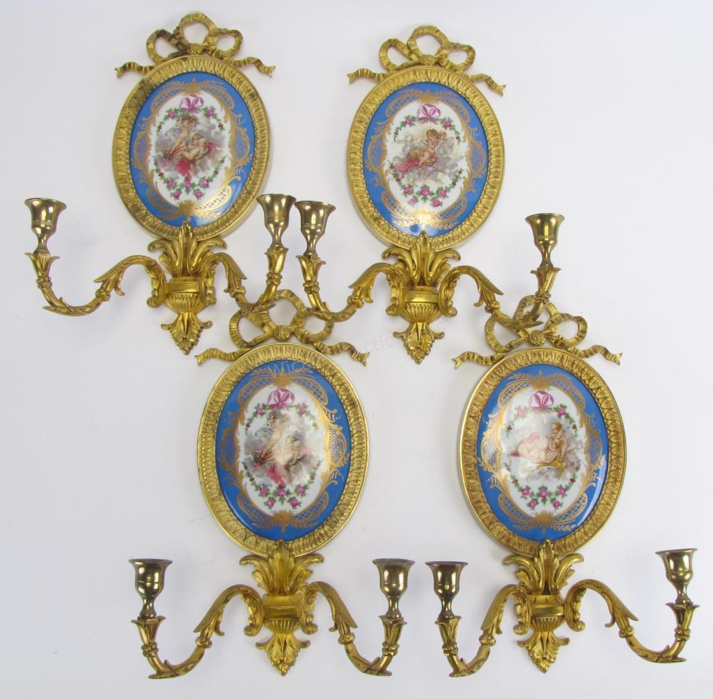 Appraisal: A group of four Sevres porcelain plaques depicting cherubs mounted