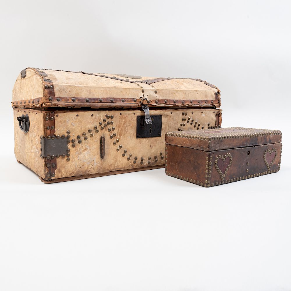 Appraisal: Pony Skin Trunk with Studded Decoration and a Leather Table