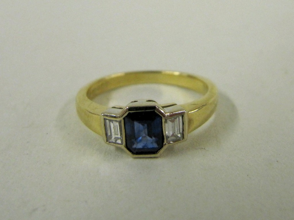 Appraisal: Eighteen carat gold diamond and sapphire three stone ring with