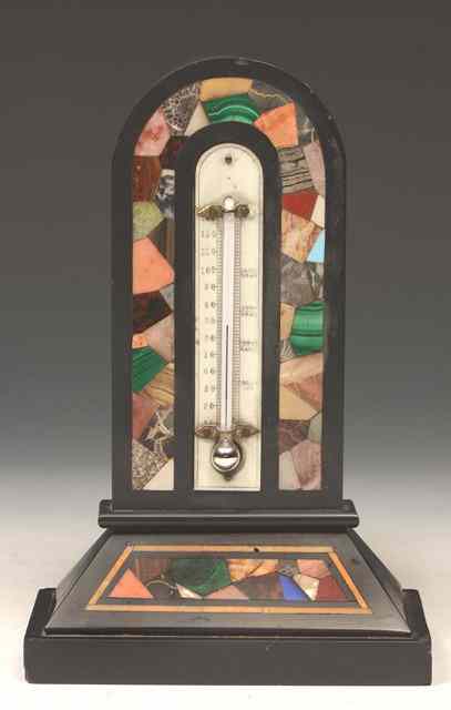 Appraisal: A SPECIMEN MARBLE THERMOMETER of arched rectangular form with mercury