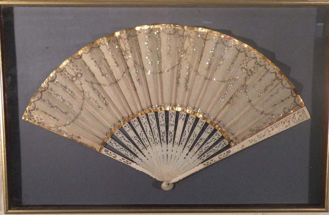 Appraisal: A Chinese ivory and mother of pearl fan with pierced