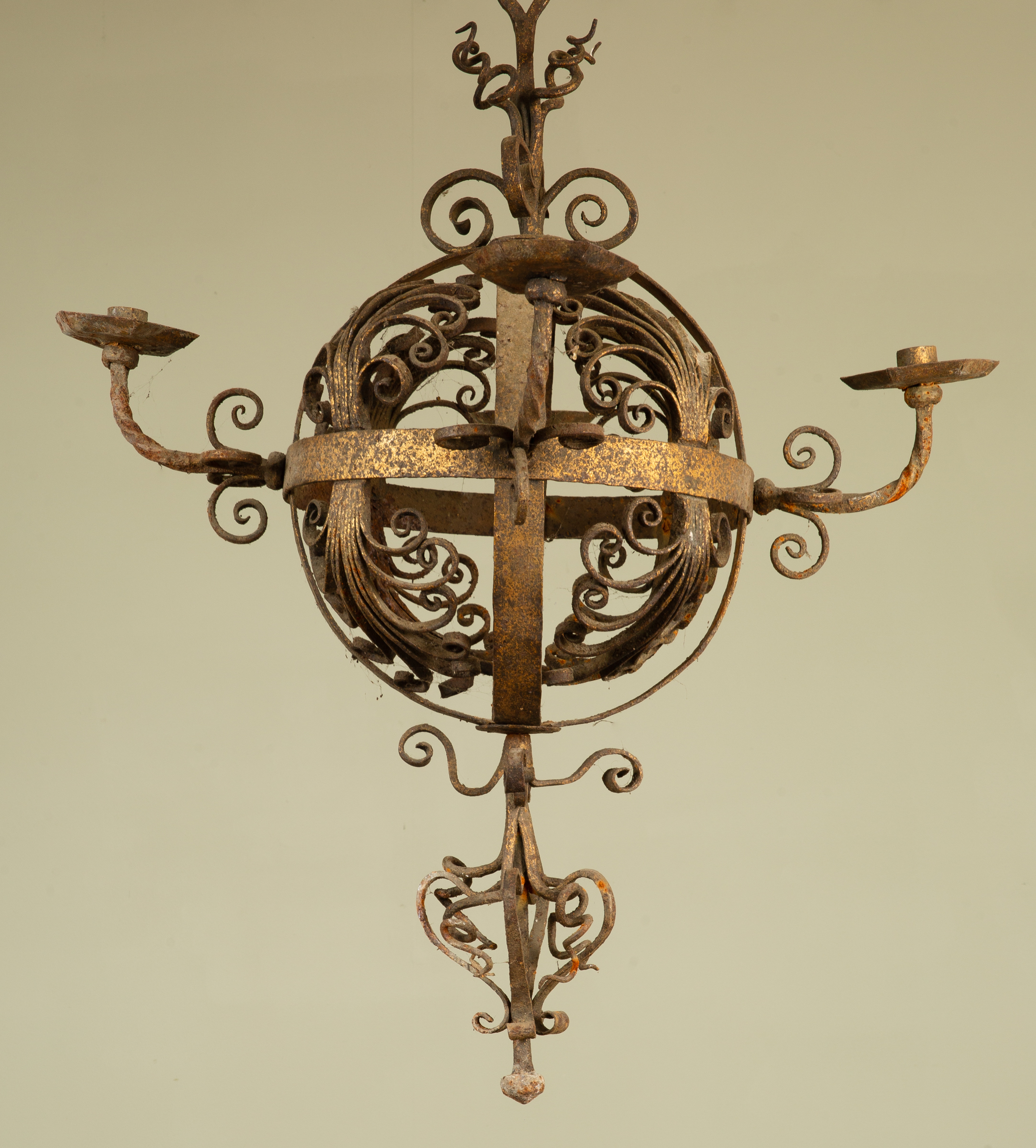 Appraisal: An early th century wrought iron hanging chandelier the central