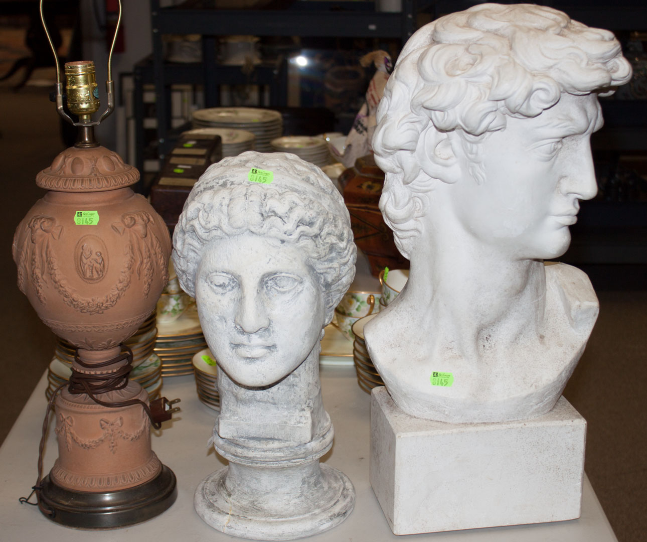 Appraisal: Two plaster busts and a ceramic lamp