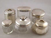 Appraisal: Six silver topped dressing jars