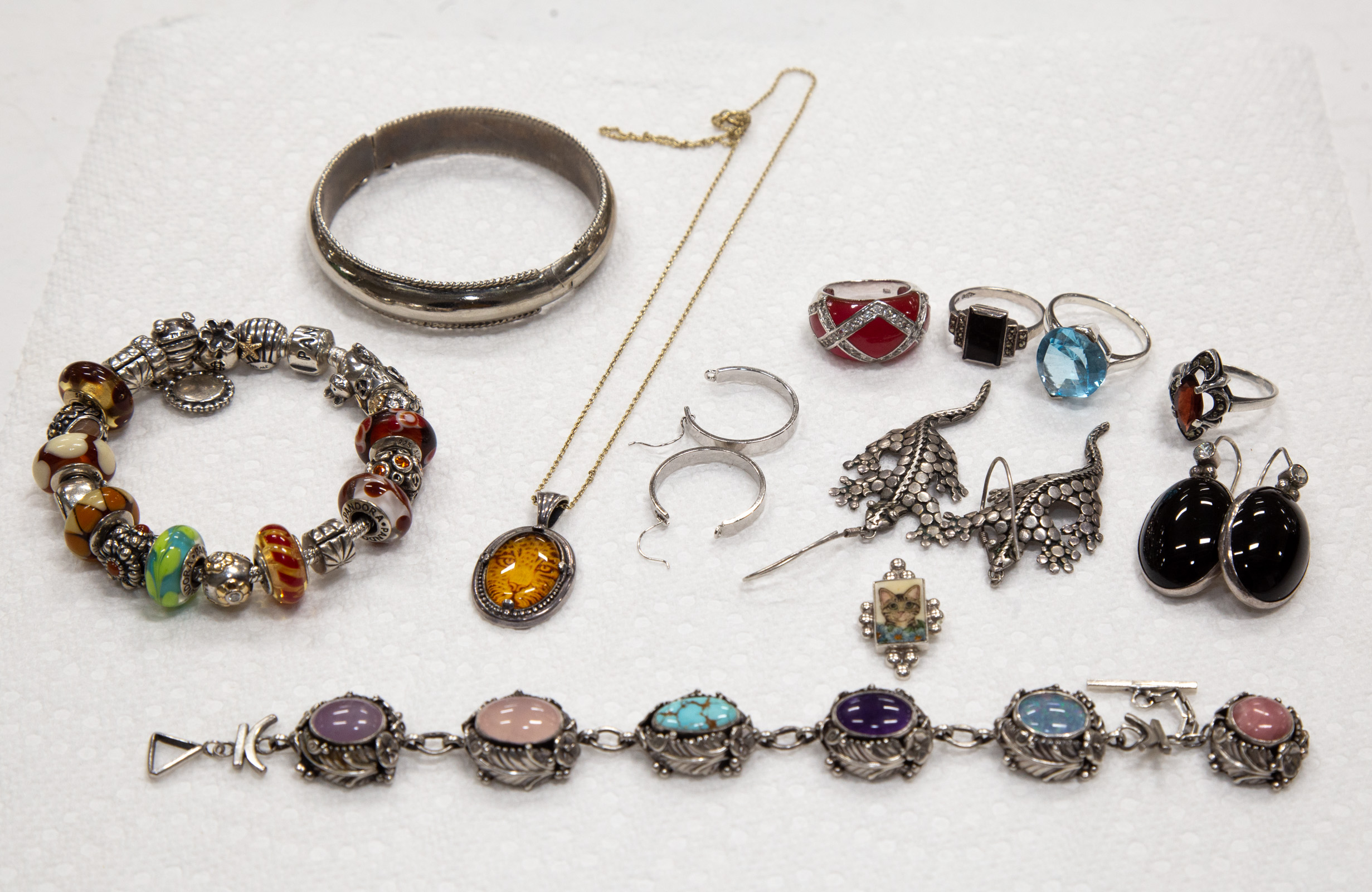 Appraisal: COLLECTION OF LADIES SILVER COSTUME JEWELRY Includes bracelets earrings and