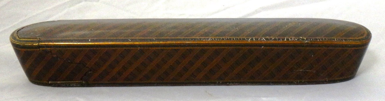 Appraisal: A Qajar lacquered papier mache pencase Qalamdan signed Abu Talib