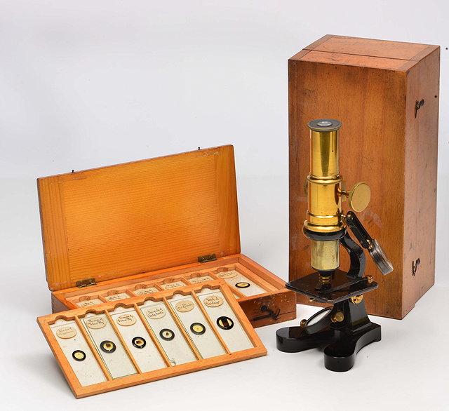 Appraisal: A STUDENT'S BRASS MONOCULAR MICROSCOPE with a fitted case together